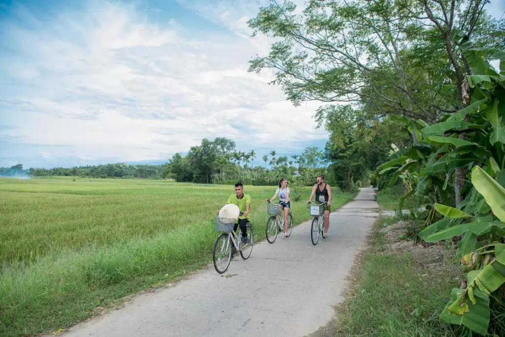 Explore Thuy Bieu Eco-Village by bicycle and boat